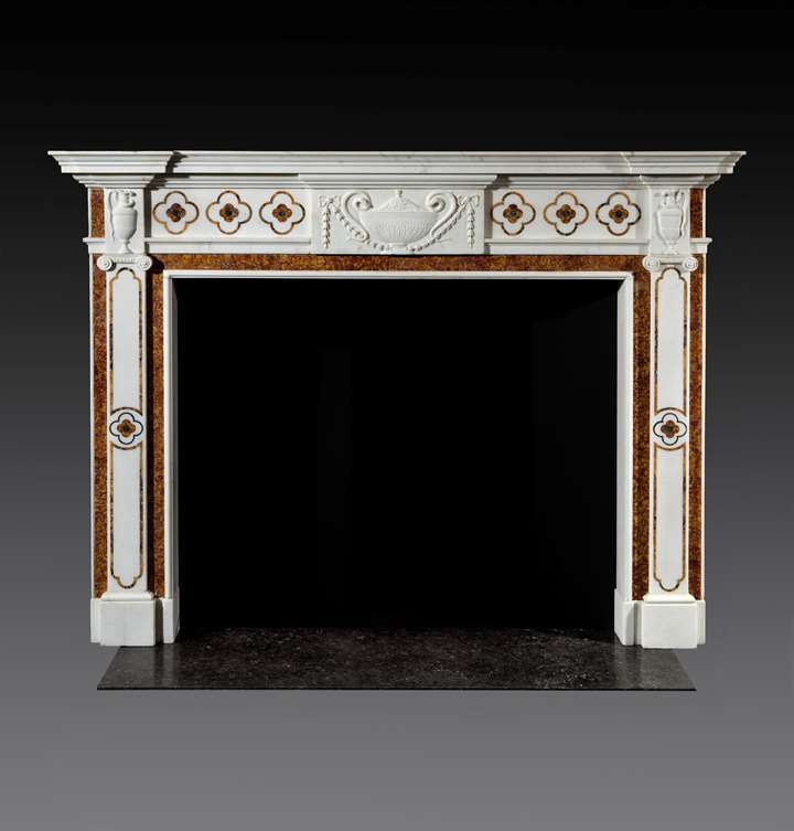 AN IRISH GEORGE III MARBLE CHIMNEYPIECE ATTRIBUTED TO GEORGE AND HILL DARLEY
